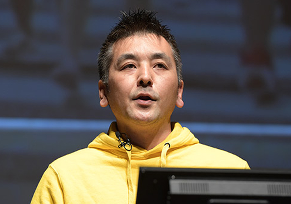 仲里 一義 氏