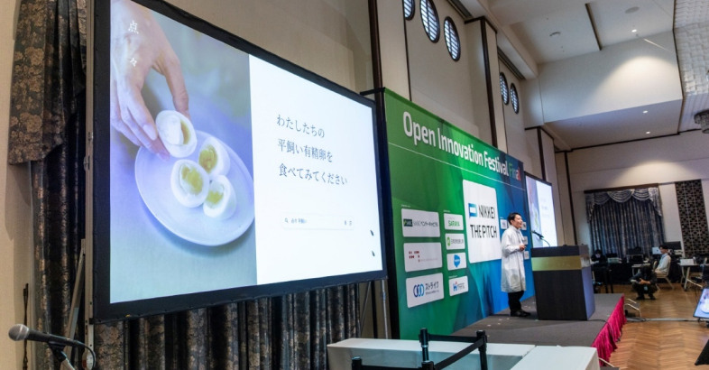 羽田氏はプレゼンで、地域の未利用資源を飼料として使い、循環型ビジネスができることを説明した