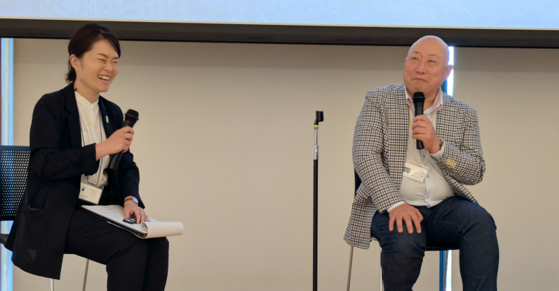 新澤巖夫代表取締役（右）はプレミアム日本酒を世界で広げてきた先駆者だ